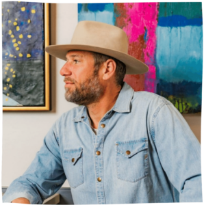 headshot of Roddy Pick seated at a table at Fork and Plough